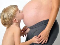אישה בהריון   ילד / צלם: תמר מצפי
